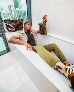 SPRAYGROUND® CHECKS IN CAMOFLAUGE CROSSOVER CLUTCH