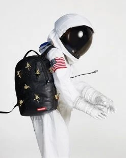 SPRAYGROUND® THE LOST IN SPACE BACKPACK (10 3D GOLD METAL ASTRONAUTS)