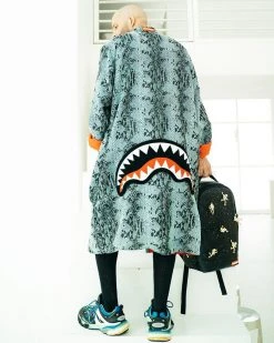 SPRAYGROUND® THE LOST IN SPACE BACKPACK (10 3D GOLD METAL ASTRONAUTS)