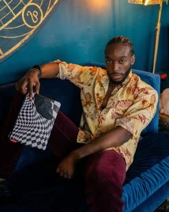 SPRAYGROUND® TRIPPY CHECK CROSSOVER CLUTCH CROSSOVER CLUTCHES