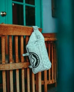 SPRAYGROUND® SPLIT THE CHECK (PEARL) CARGO CROSSBODY BAGS