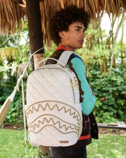 SPRAYGROUND® RIVIERA LE BLANC GOLD CHAIN SHARK BACKPACK (DLXV) BAGS