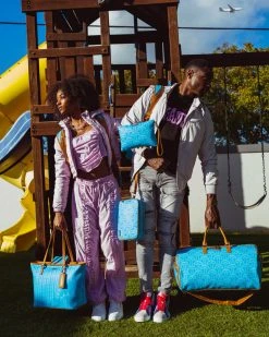 SPRAYGROUND® ILLUCHAINS TURQ CROSSOVER CLUTCH CROSSOVER CLUTCHES