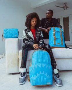 SPRAYGROUND® ILLUCHAINS TURQ TOILETRY BAG BAGS