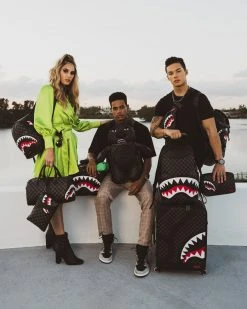 SPRAYGROUND® HENNY AIIR TO THE THRONE CROSSOVER CLUTCH CROSSOVER CLUTCHES