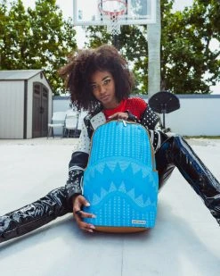 SPRAYGROUND® ILLUCHAINS TURQ BACKPACK (DLXV) BAGS