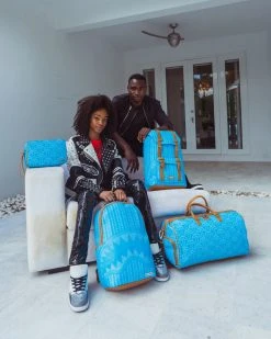 SPRAYGROUND® ILLUCHAINS TURQ BACKPACK (DLXV) BAGS