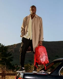 SPRAYGROUND® XTC SHARKS IN WONDERLAND BACKPACK (DLXV)