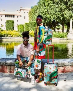 SPRAYGROUND® THE SANCTUARY SHARKNAUTICS HARDSHELL CARRY-ON LUGGAGE 29 SPRAYGROUND® THE SANCTUARY SHARKNAUTICS HARDSHELL CARRY-ON LUGGAGE