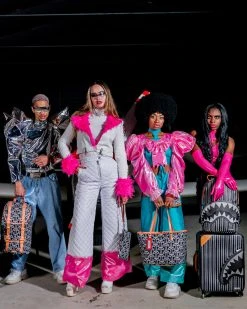 SPRAYGROUND® ILLUCHAINS CUT & SEW VEGAN LEATHER CARRY-ON LUGGAGE