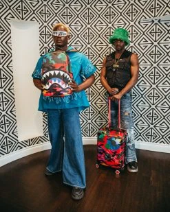 SPRAYGROUND® CAMOBURST SHARKNAUTICS HARDSHELL CARRY-ON LUGGAGE 27 SPRAYGROUND® CAMOBURST SHARKNAUTICS HARDSHELL CARRY-ON LUGGAGE