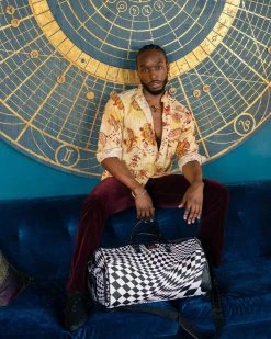 SPRAYGROUND® TRIPPY CHECK DUFFLE BAGS