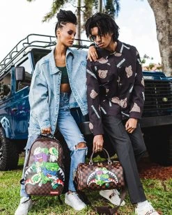 SPRAYGROUND® MONEY CHASER MINI DUFFLE BAGS