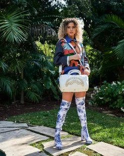 SPRAYGROUND® RIVIERA LE BLANC GOLD CHAIN SHARK MINI DUFFLE 23 SPRAYGROUND® RIVIERA LE BLANC GOLD CHAIN SHARK MINI DUFFLE