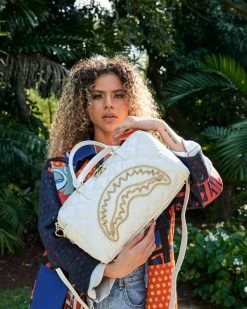 SPRAYGROUND® RIVIERA LE BLANC GOLD CHAIN SHARK MINI DUFFLE 19 SPRAYGROUND® RIVIERA LE BLANC GOLD CHAIN SHARK MINI DUFFLE