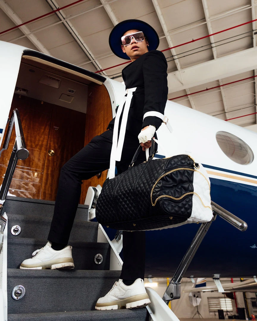 SPRAYGROUND® LEVELED UP SPLIT QUILT SHARK DUFFLE 12 SPRAYGROUND® LEVELED UP SPLIT QUILT SHARK DUFFLE