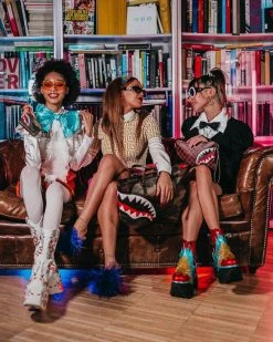 SPRAYGROUND® CHECKS IN CAMOFLAUGE CROSSOVER CLUTCH