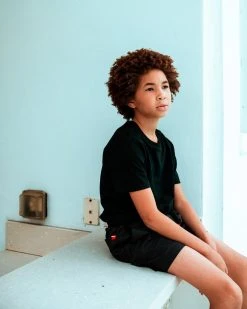 SPRAYGROUND® KIDS LIGHTS OUT SWIM TRUNKS SWIMWEAR