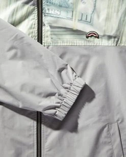 SPRAYGROUND® MONEY STACKS WINDBREAKER (GREY) APPAREL+GEAR