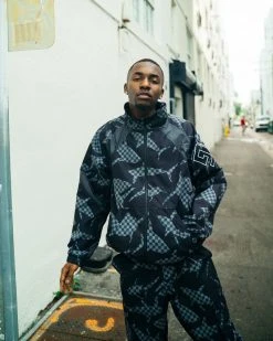 SPRAYGROUND® SHARK CHECK WINDBREAKER JOGGER (BLACK) APPAREL+GEAR