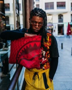 SPRAYGROUND® MONEYGRAM BRICK TOTE BAGS